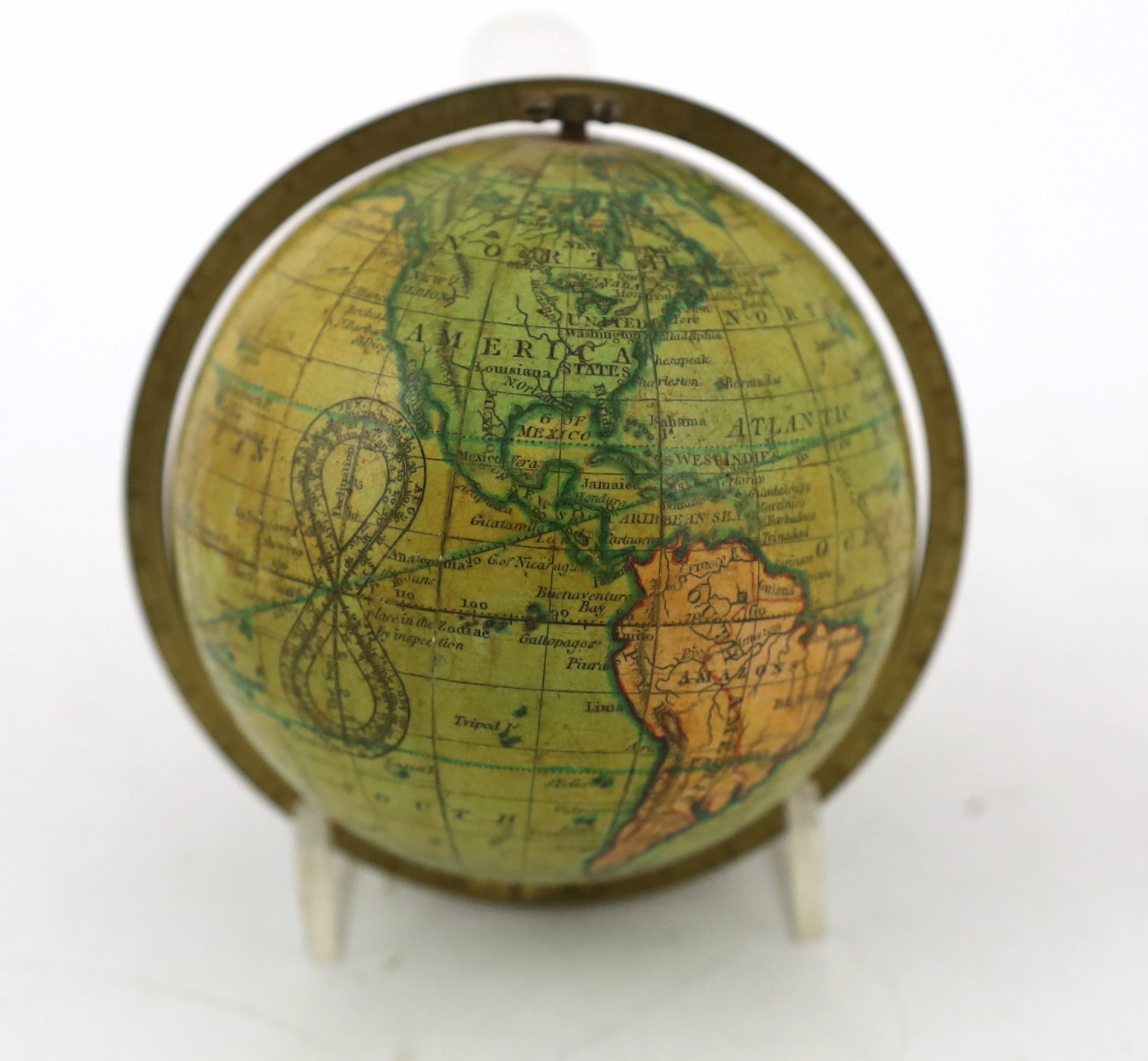 A Newton's 'New & Improved terrestrial pocket globe', 7,5cm, case 10cm